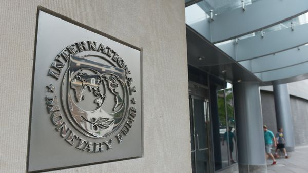 The seal of the International Monetary Fund is seen on a headquarters building in Washington The seal of the International Monetary Fund is seen on a headquarters building in Washington - Sputnik International