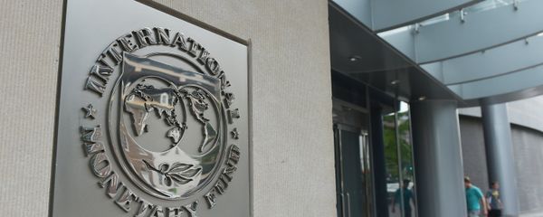 The seal of the International Monetary Fund is seen on a headquarters building in Washington The seal of the International Monetary Fund is seen on a headquarters building in Washington - Sputnik International