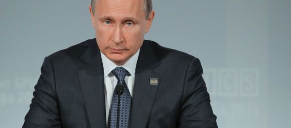 President of the Russian Federation Vladimir Putin during the signing of joint documents following the BRICS leaders meeting - Sputnik International