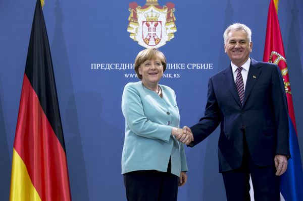German Chancellor Angela Merkel shakes hands with Serbian President Tomislav Nikolic before their meeting in Belgrade, Serbia July 9, 2015 German Chancellor Angela Merkel shakes hands with Serbian President Tomislav Nikolic before their meeting in Belgrade, Serbia July 9, 2015 - Sputnik International