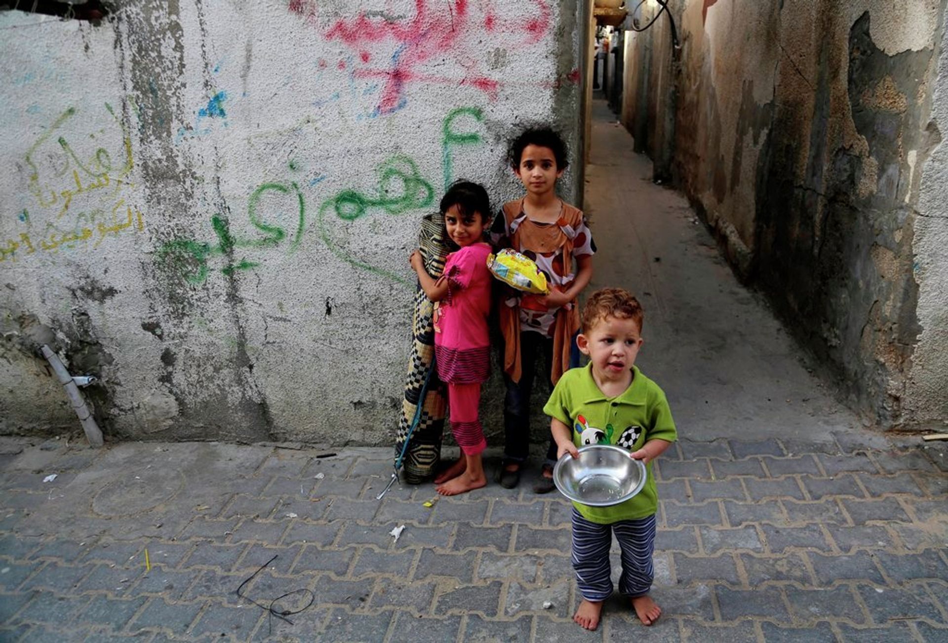 Palestinian children pose for a photo at the Jebaliya refugee camp in the northern Gaza Strip, Thursday, May 14, 2015.  - Sputnik International, 1920, 21.11.2021