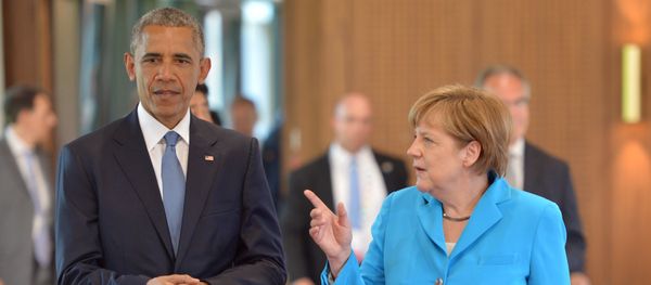 US President Barack Obama and Germany's Chancellor Angela Merkel, arrive for the first working session of a G7 summit at the Elmau Castle near Garmisch-Partenkirchen, southern Germany, on June 7, 2015 - Sputnik International