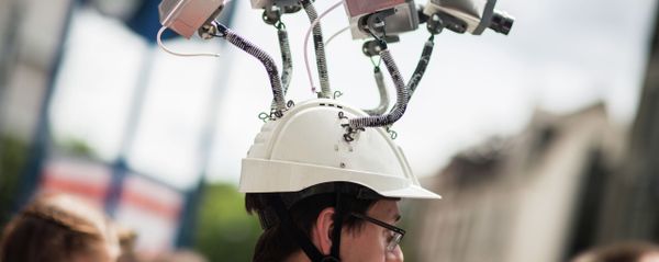 Chairman of Hesse's Pirate Party Volker Berkhout wears a hat with mock surveillance cameras during a demonstration against spying activities of the US intelligence agency NSA and its German partner service BND in Frankfurt am Main, central Germany, on May 30, 2015 Chairman of Hesse's Pirate Party Volker Berkhout wears a hat with mock surveillance cameras during a demonstration against spying activities of the US intelligence agency NSA and its German partner service BND in Frankfurt am Main, central Germany, on May 30, 2015 - Sputnik International