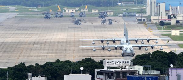 (FILES) A file picture taken on April 24, 2010 shows planes and helicopters stationed at the US Marine Corps Air Station Futenma base in Ginowan, Okinawa prefecture - Sputnik International