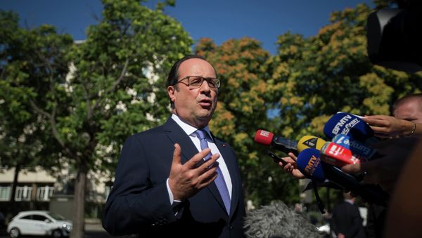 French President Francois Hollande speaks to journalists about Greece after attending the launch of the 'Employment and Insertion' at the headquarters of the French National Olympic and Sports Committee in Paris, France, July 10, 2015 French President Francois Hollande speaks to journalists about Greece after attending the launch of the 'Employment and Insertion' at the headquarters of the French National Olympic and Sports Committee in Paris, France, July 10, 2015 - Sputnik International