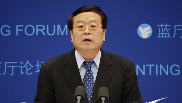 Chinese vice-foreign minister Cheng Guoping answers questions during a Shanghai Cooperation Organisation (SCO) forum prior to next month's summit between the Presidents of Rusia, Iran and China, in Beijing on May 29, 2012 - Sputnik International