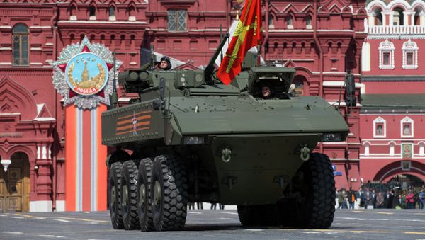 Bumerang armored personnel carrier drives during the Victory Parade marking the 70th anniversary of the defeat of the Nazis in World War II, in Red Square in Moscow, Russia, Saturday, May 9, 2015 - Sputnik International