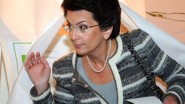 Georgian presidential candidate Nino Burjanadze exits a voting booth at a polling station during Georgia's presidential election in Tbilisi on October 27, 2013 - Sputnik International