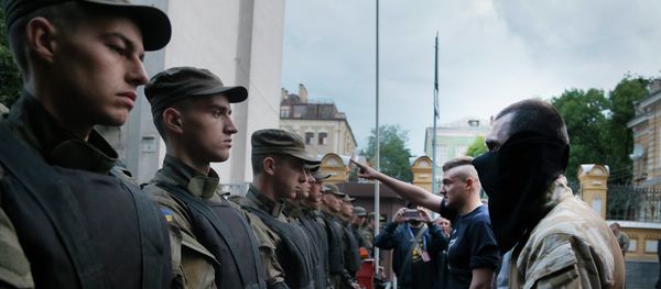 Activists from the Right Sector party confront police who are blocking a street leading to the Ukrainian Presidential administration building in Kiev, Ukraine, Saturday, July 11, 2015 Activists from the Right Sector party confront police who are blocking a street leading to the Ukrainian Presidential administration building in Kiev, Ukraine, Saturday, July 11, 2015 - Sputnik International