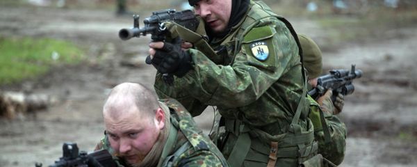 Fighters of the Azov paramilitary battalion, a pro-Ukrainian volunteer armed group, take part in combat drills near the southern Ukrainian city of Mariupol on February 6, 2015 Fighters of the Azov paramilitary battalion, a pro-Ukrainian volunteer armed group, take part in combat drills near the southern Ukrainian city of Mariupol on February 6, 2015 - Sputnik International
