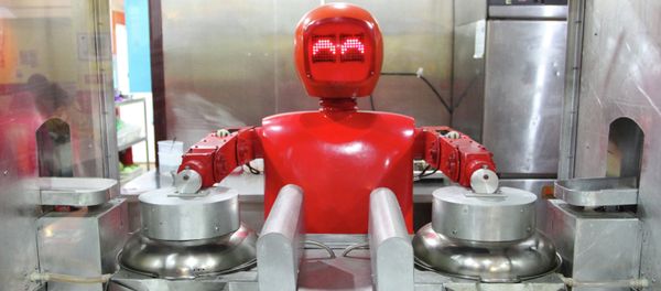 A robot cooks in a robot-themed restaurant in Harbin, northeast China's Heilongjiang province on January 16, 2013 A robot cooks in a robot-themed restaurant in Harbin, northeast China's Heilongjiang province on January 16, 2013 - Sputnik International