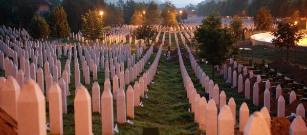 Gravestones are seen at sunrise at a memorial complex near Srebrenica, 150 kilometers (94 miles) northeast of Sarajevo, Bosnia and Herzegovina, Saturday, July 11, 2015 Gravestones are seen at sunrise at a memorial complex near Srebrenica, 150 kilometers (94 miles) northeast of Sarajevo, Bosnia and Herzegovina, Saturday, July 11, 2015 - Sputnik International