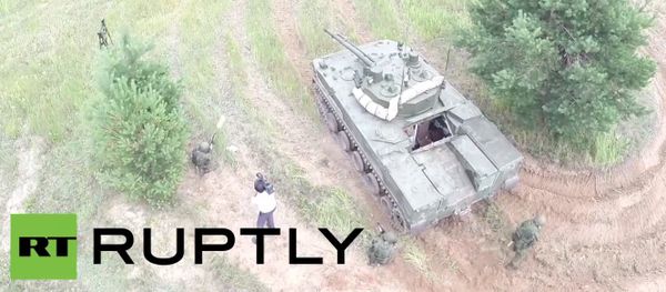 Russia: Drone captures DefMin's newest APCs in full-firing action Russia: Drone captures DefMin's newest APCs in full-firing action - Sputnik International