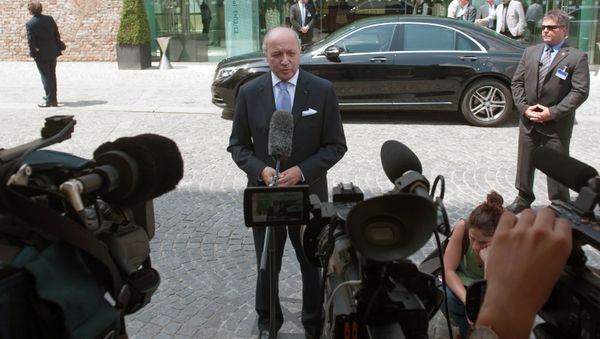 French Foreign Minister Laurent Fabius speaks to journalists in front of the Palais Coburg Hotel, where the Iran nuclear talks meetings are being held, in Vienna, Austria on July 12, 2015 French Foreign Minister Laurent Fabius speaks to journalists in front of the Palais Coburg Hotel, where the Iran nuclear talks meetings are being held, in Vienna, Austria on July 12, 2015 - Sputnik International