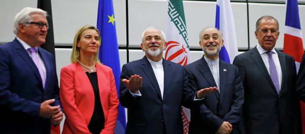 German Minister for Foreign Affairs Frank-Walter Steinmeier, High Representative of the European Union for Foreign Affairs and Security Policy Federica Mogherini, Iranian Foreign Minister Mohammad Javad Zarif, Iranian ambassador to IAEA Ali Akbar Salehi and Russian Foreign Minister Sergey Lavrov (L-R), prepare for a family photo in Vienna, Austria 14 July, 2015 German Minister for Foreign Affairs Frank-Walter Steinmeier, High Representative of the European Union for Foreign Affairs and Security Policy Federica Mogherini, Iranian Foreign Minister Mohammad Javad Zarif, Iranian ambassador to IAEA Ali Akbar Salehi and Russian Foreign Minister Sergey Lavrov (L-R), prepare for a family photo in Vienna, Austria 14 July, 2015 - Sputnik International