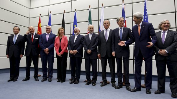 (From L to R) Chinese Foreign Minister Wang Yi, French Foreign Minister Laurent Fabius, German Foreign Minister Frank Walter Steinmeier, European Union High Representative for Foreign Affairs and Security Policy Federica Mogherini, Iranian Foreign Minister Mohammad Javad Zarif, Head of the Iranian Atomic Energy Organization Ali Akbar Salehi, Russian Foreign Minister Sergey Lavrov, British Foreign Secretary Philip Hammon, U.S. Secretary of State John Kerry and U.S. Secretary of Energy Ernest Moniz pose for a group picture at the United Nations building in Vienna, Austria July 14, 2015 (From L to R) Chinese Foreign Minister Wang Yi, French Foreign Minister Laurent Fabius, German Foreign Minister Frank Walter Steinmeier, European Union High Representative for Foreign Affairs and Security Policy Federica Mogherini, Iranian Foreign Minister Mohammad Javad Zarif, Head of the Iranian Atomic Energy Organization Ali Akbar Salehi, Russian Foreign Minister Sergey Lavrov, British Foreign Secretary Philip Hammon, U.S. Secretary of State John Kerry and U.S. Secretary of Energy Ernest Moniz pose for a group picture at the United Nations building in Vienna, Austria July 14, 2015 - Sputnik International