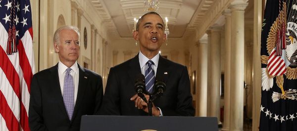 U.S. President Barack Obama speaks with Vice President Joe Biden at his side as he delivers a statement about the nuclear deal reached between Iran and six major world powers during an early morning address to the nation from the East Room of the White House in Washington, July 14, 2015 U.S. President Barack Obama speaks with Vice President Joe Biden at his side as he delivers a statement about the nuclear deal reached between Iran and six major world powers during an early morning address to the nation from the East Room of the White House in Washington, July 14, 2015 - Sputnik International