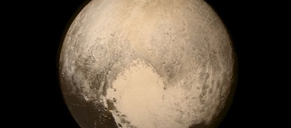 Pluto nearly fills the frame in this image from the Long Range Reconnaissance Imager (LORRI) aboard NASA's New Horizons spacecraft, taken on July 13, 2015, when the spacecraft was 476,000 miles (768,000 kilometers) from the surface and released on July 14, 2015 Pluto nearly fills the frame in this image from the Long Range Reconnaissance Imager (LORRI) aboard NASA's New Horizons spacecraft, taken on July 13, 2015, when the spacecraft was 476,000 miles (768,000 kilometers) from the surface and released on July 14, 2015 - Sputnik International