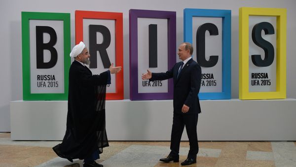 President of the Russian Federation Vladimir Putin, right, and President of the Islamic Republic of Iran Hassan Rouhani at the welcome ceremony for the leaders of the invited states President of the Russian Federation Vladimir Putin, right, and President of the Islamic Republic of Iran Hassan Rouhani at the welcome ceremony for the leaders of the invited states - Sputnik International