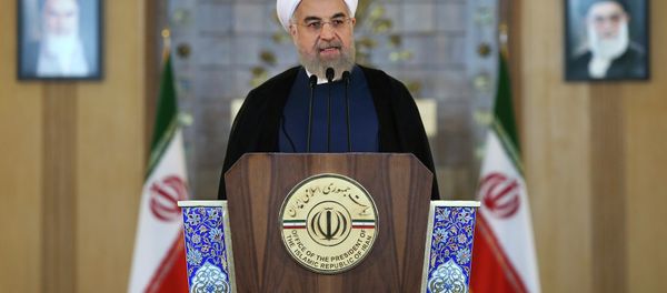 Iran's President Hassan Rouhani addresses the nation in a televised speech after a nuclear agreement was announced in Vienna, in Tehran, Iran, Tuesday, July 14, 2015. Iran's President Hassan Rouhani addresses the nation in a televised speech after a nuclear agreement was announced in Vienna, in Tehran, Iran, Tuesday, July 14, 2015. - Sputnik International