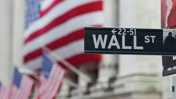 A Wall Street sign hangs near the New York Stock Exchange. A Wall Street sign hangs near the New York Stock Exchange. - Sputnik International