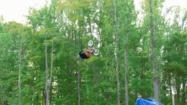 See it to Believe it! First Ever BMX Quadruple Backflip - Sputnik International