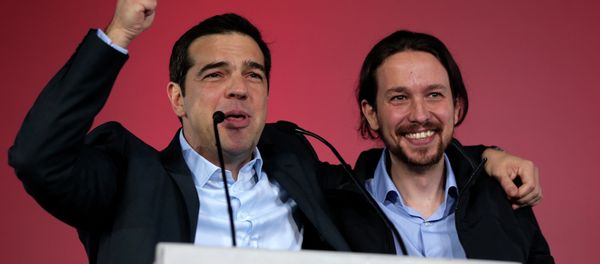 Alexis Tsipras, leader of Greece's Syriza left-wing main opposition party, left, and Pablo Iglesias leader of Spanish Podemos left-wing party wave to the crowd after a pre-election speech at Omonia Square in Athens on Thursday, Jan. 22, 2015. Alexis Tsipras, leader of Greece's Syriza left-wing main opposition party, left, and Pablo Iglesias leader of Spanish Podemos left-wing party wave to the crowd after a pre-election speech at Omonia Square in Athens on Thursday, Jan. 22, 2015. - Sputnik International
