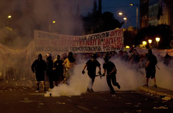 Anti-austerity protesters clash with riot police during a rally in Athens, Wednesday, July 15, 2015 Anti-austerity protesters clash with riot police during a rally in Athens, Wednesday, July 15, 2015 - Sputnik International