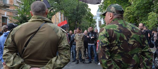 Ukrainian President Petro Poroshenko should be worried, as things are getting hot on the streets of Kiev amid the standoff between the Ukrainian government and the Neo-Nazi radical group Right Sector. Ukrainian President Petro Poroshenko should be worried, as things are getting hot on the streets of Kiev amid the standoff between the Ukrainian government and the Neo-Nazi radical group Right Sector. - Sputnik International