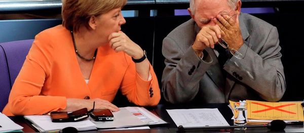 German Chancellor Angela Merkel, left, talks to Finance Minister Wolfgang Schaeuble during a debate on the Greek financial crisis at the German parliament in Berlin, Wednesday, July 1, 2015. German Chancellor Angela Merkel, left, talks to Finance Minister Wolfgang Schaeuble during a debate on the Greek financial crisis at the German parliament in Berlin, Wednesday, July 1, 2015. - Sputnik International