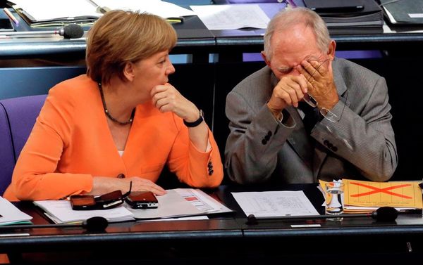 German Chancellor Angela Merkel, left, talks to Finance Minister Wolfgang Schaeuble during a debate on the Greek financial crisis at the German parliament in Berlin, Wednesday, July 1, 2015. German Chancellor Angela Merkel, left, talks to Finance Minister Wolfgang Schaeuble during a debate on the Greek financial crisis at the German parliament in Berlin, Wednesday, July 1, 2015. - Sputnik International