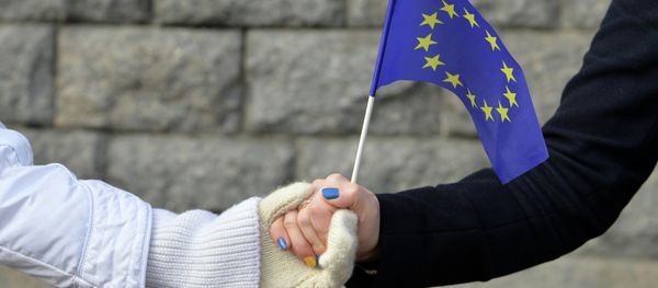 Ukrainian students stand hand in hand to create a human chain symbolizing the unity of Ukraine with EU during their action in Kiev Ukrainian students stand hand in hand to create a human chain symbolizing the unity of Ukraine with EU during their action in Kiev - Sputnik International