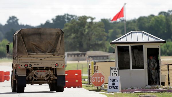 Military vehicles are seen at Texas Army National Guard Camp Swift, Wednesday, July 15, 2015, in Bastrop, Texas - Sputnik International