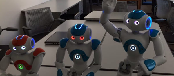 Three robots at the Ransselaer Polytechnic Institute in New York are put through a self-awareness test. - Sputnik International