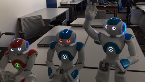 Three robots at the Ransselaer Polytechnic Institute in New York are put through a self-awareness test. Three robots at the Ransselaer Polytechnic Institute in New York are put through a self-awareness test. - Sputnik International