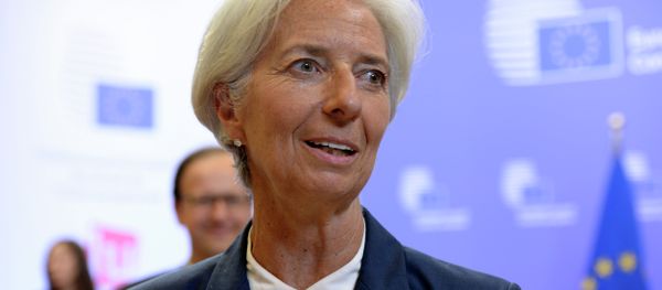International Monetary Fund's (IMF) Managing Director Christine Lagarde talks to the media at the end of an Eurozone Summit over the Greek debt crisis in Brussels on July 13, 2015 International Monetary Fund's (IMF) Managing Director Christine Lagarde talks to the media at the end of an Eurozone Summit over the Greek debt crisis in Brussels on July 13, 2015 - Sputnik International
