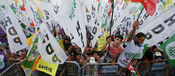 Supporters listen to Selahattin Demirtas, co-chair of the pro-Kurdish Peoples' Democratic Party, HDP, as he addresses an election rally in Istanbul, Turkey, Saturday, May 30, 2015 - Sputnik International
