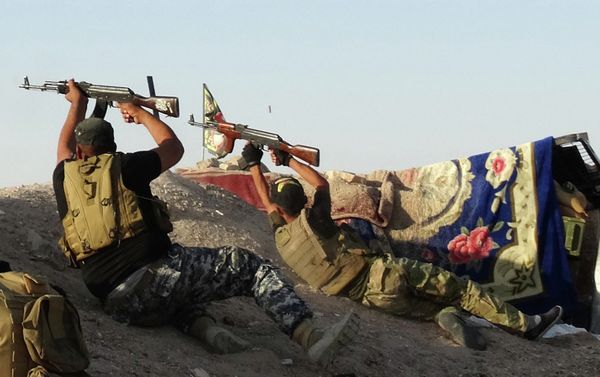 Iraqi security forces defend their positions against Islamic State group attack in Husaybah, 5 miles east of Ramadi, Iraq. Iraqi security forces defend their positions against Islamic State group attack in Husaybah, 5 miles east of Ramadi, Iraq. - Sputnik International