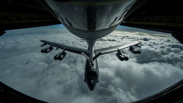 A B-52 Stratofortress is refueled in-flight over the Pacific Ocean. A B-52 Stratofortress is refueled in-flight over the Pacific Ocean. - Sputnik International