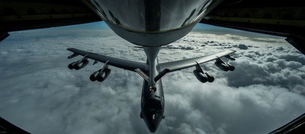 A B-52 Stratofortress is refueled in-flight over the Pacific Ocean. A B-52 Stratofortress is refueled in-flight over the Pacific Ocean. - Sputnik International