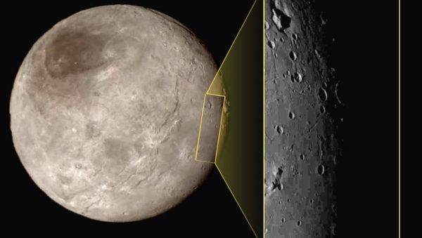 This photo shows Pluto's largest moon Charon, left, with a captivating feature, a depression with a peak in the middle, shown in the upper left corner of the inset image at right. This photo shows Pluto's largest moon Charon, left, with a captivating feature, a depression with a peak in the middle, shown in the upper left corner of the inset image at right. - Sputnik International