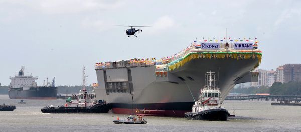 Tugboats guide the indigenously-built aircraft carrier INS Vikrant as it leaves the Cochin Shipyard Limited's dock after its launch in Kochi on August 12, 2013 Tugboats guide the indigenously-built aircraft carrier INS Vikrant as it leaves the Cochin Shipyard Limited's dock after its launch in Kochi on August 12, 2013 - Sputnik International