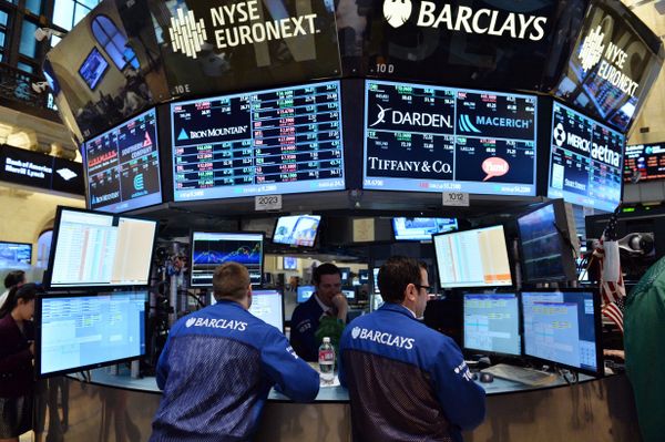 Stock specialists at the Barclays post work on the floor of the New York Stock Exchange just after the closing bell on July 3, 2013 in New York - Sputnik International