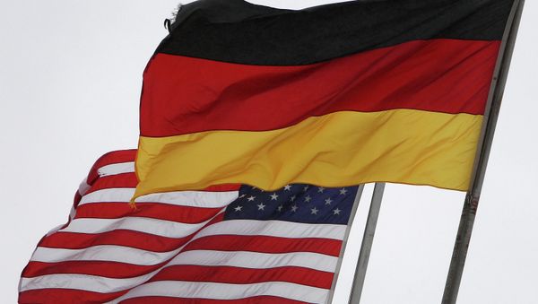 The German and the US flags fly at the US Airbase in Ramstein, southern Germany, on November 6, 2013 - Sputnik International