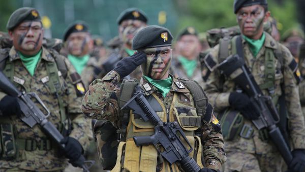 Philippine troopers participate in ceremonies on the 79th anniversary of the Armed Forces of the Philippines (AFP) at Camp Aguinaldo military headquarters in suburban Quezon city, north of Manila, Philippines on Thursday, Dec. 18, 2014 - Sputnik International