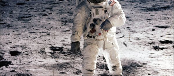 This picture taken 21 July 1969 of astronaut Edwin E. Aldrin Jr. walking on the surface of the moon near the leg of the Lunar Module (ML) Eagle and astronaut Neil Armstrong, during the Apollo 11 extravehicular activity (EVA). NASA no longer knows the whereabouts of the original tapes of man's first landing on the moon nearly 40 years ago, an official of the US space agency said 15 August 2006 - Sputnik International