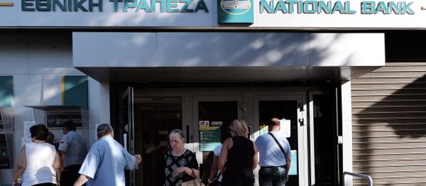 People wait outside of a national bank branch in Athens on July 20, 2015 - Sputnik International