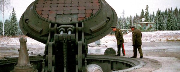 Russian high ranking military officials, look into an opened silo of a Russian intercontinental ballistic Topol-M missile somewhere at undisclosed location in Russia in this 2001 photo Russian high ranking military officials, look into an opened silo of a Russian intercontinental ballistic Topol-M missile somewhere at undisclosed location in Russia in this 2001 photo - Sputnik International