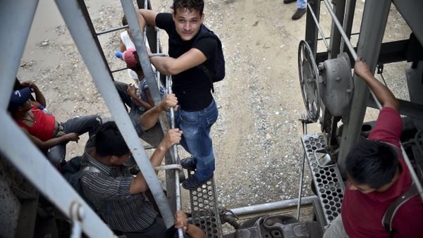 Central American migrants ride the train called The Beast in their attemp to reach the border between Mexico and The United States. Central American migrants ride the train called The Beast in their attemp to reach the border between Mexico and The United States. - Sputnik International