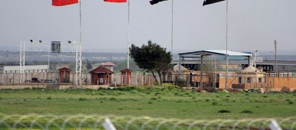 In this photo taken Tuesday, April 10, 2012, the border crossing between Turkey and Syria is seen from a refugee camp near the border, in Kilis , Turkey. In this photo taken Tuesday, April 10, 2012, the border crossing between Turkey and Syria is seen from a refugee camp near the border, in Kilis , Turkey. - Sputnik International